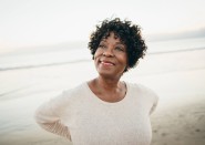 Older Black Woman Outside at Beach